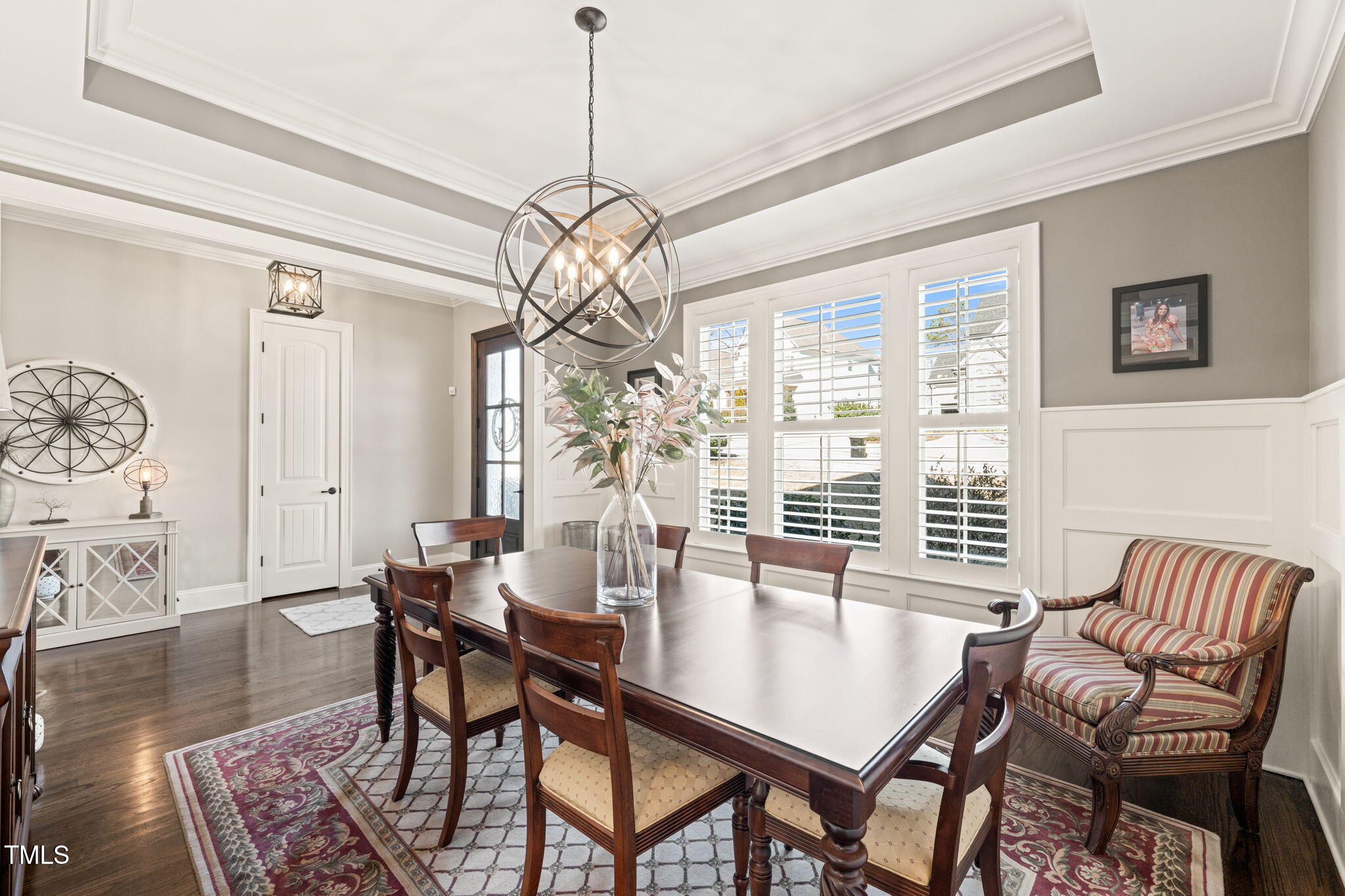 1301 Mackinaw Drive Wake Forest, NC 27587 - Photo 12 of 55 a view of a dining room with furniture window and wooden floor