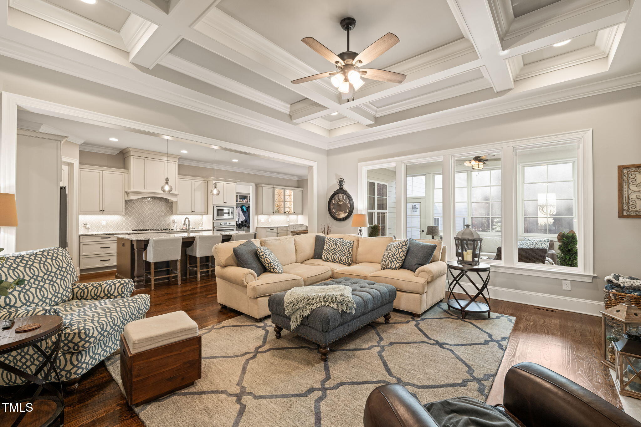 1301 Mackinaw Drive Wake Forest, NC 27587 - Photo 13 of 55 a living room with furniture or couches and a large kitchen view
