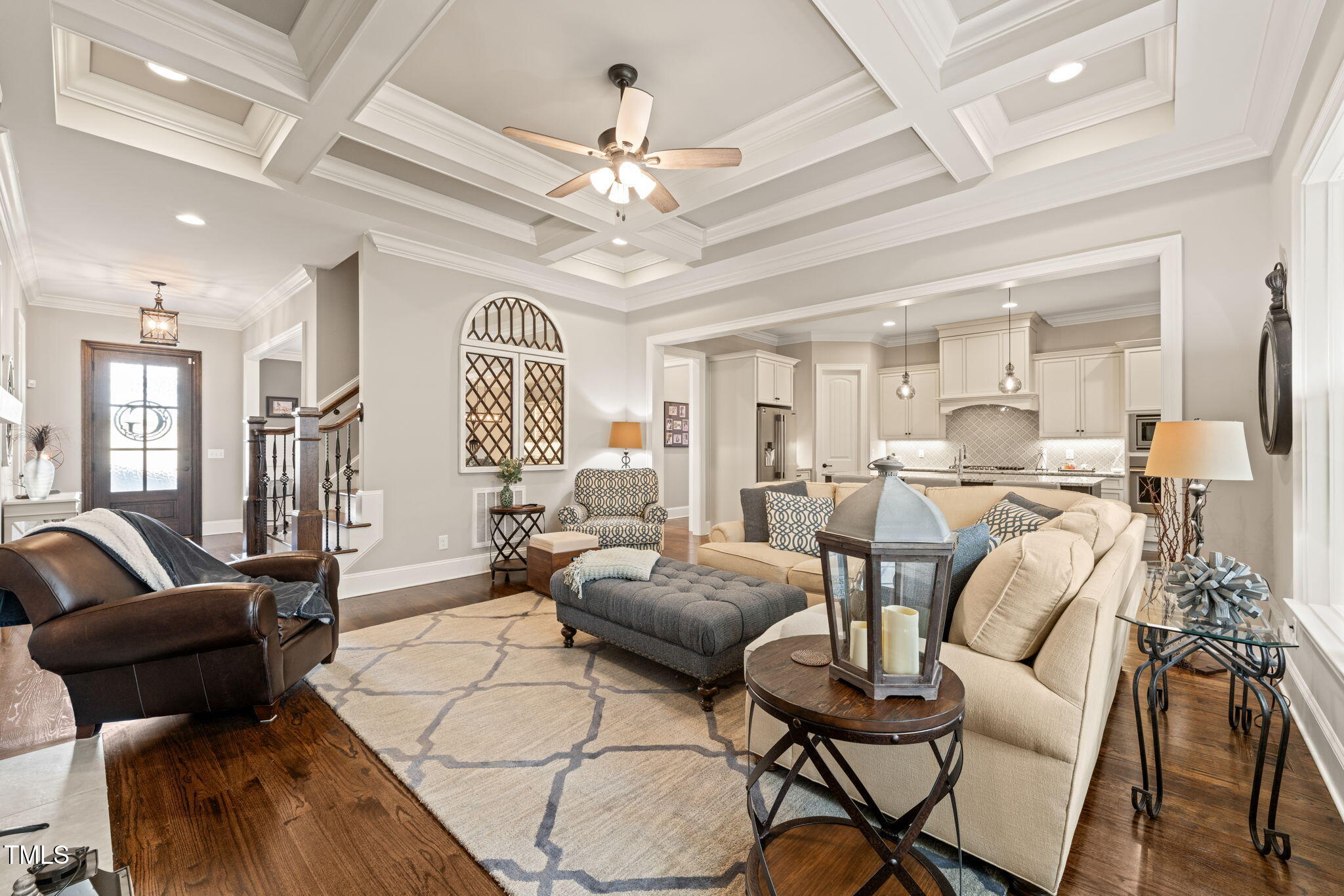 1301 Mackinaw Drive Wake Forest, NC 27587 - Photo 14 of 55 a living room with furniture and a chandelier