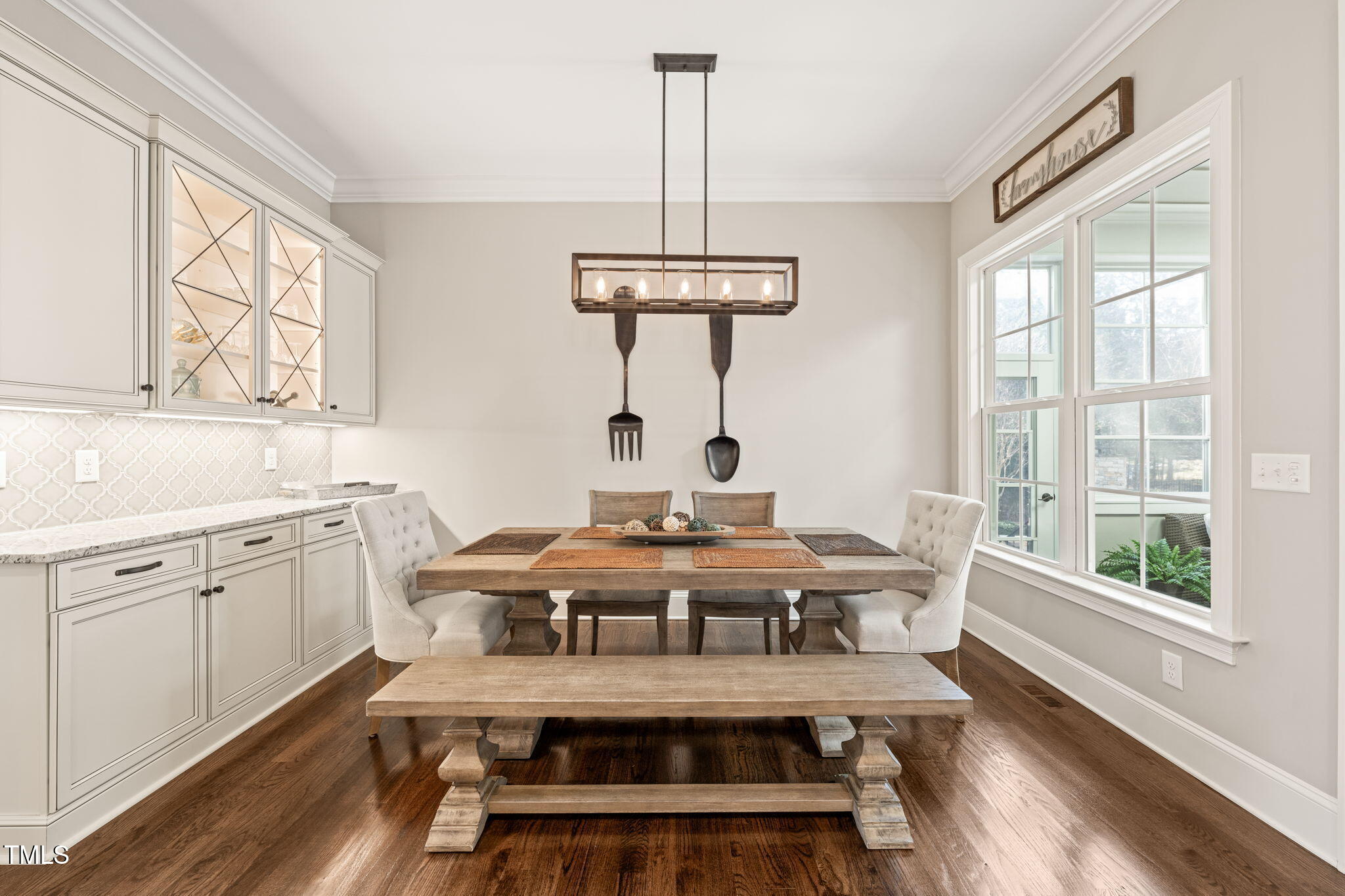 1301 Mackinaw Drive Wake Forest, NC 27587 - Photo 21 of 55 a view of a dining room with furniture window and wooden floor