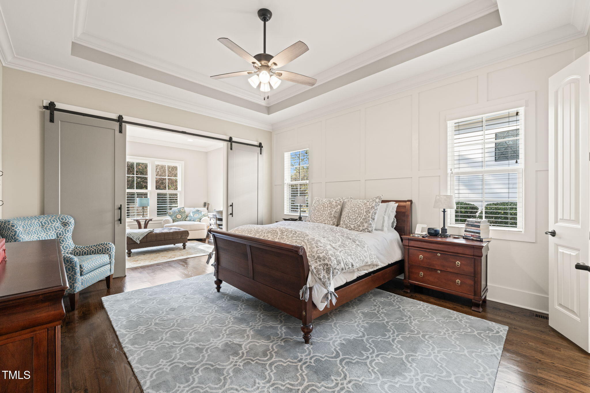 1301 Mackinaw Drive Wake Forest, NC 27587 - Photo 26 of 55 a spacious bedroom with a bed and a chandelier