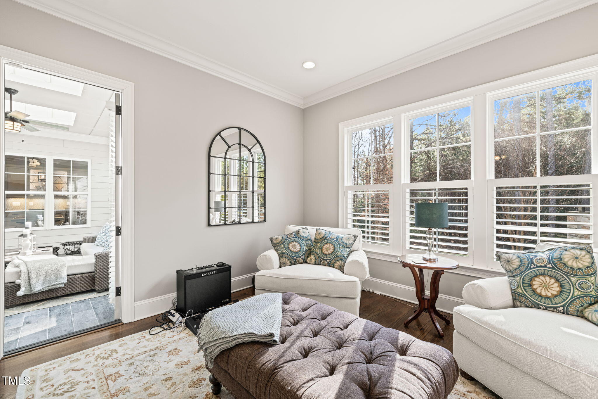 1301 Mackinaw Drive Wake Forest, NC 27587 - Photo 28 of 55 a living room with furniture and a large window