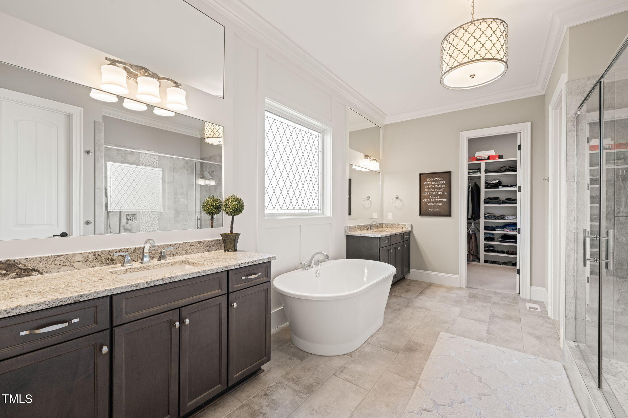 1301 Mackinaw Drive Wake Forest, NC 27587 - Photo 30 of 55 a spacious bathroom with a toilet sink and mirror