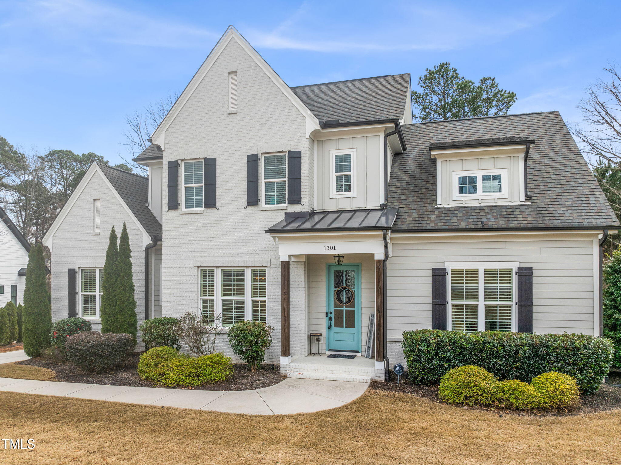 1301 Mackinaw Drive Wake Forest, NC 27587 - Photo 3 of 55 a front view of a house with yard and parking