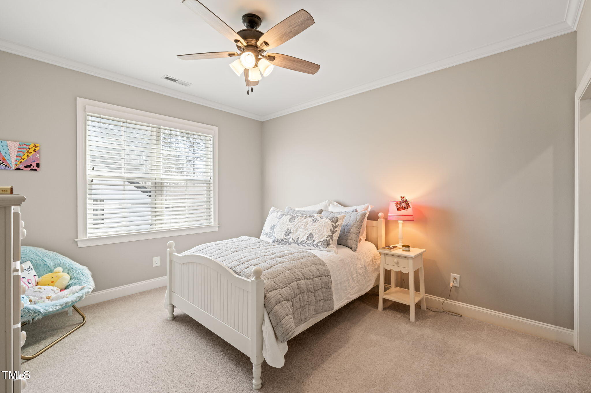 1301 Mackinaw Drive Wake Forest, NC 27587 - Photo 40 of 55 a bedroom with a bed and a window