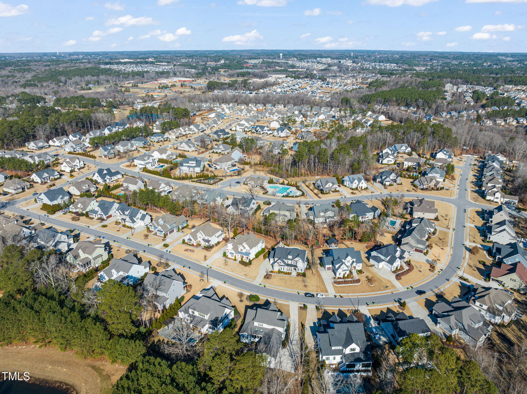 1301 Mackinaw Drive Wake Forest, NC 27587 - Photo 52 of 55 an aerial view of residential houses with outdoor space and trees