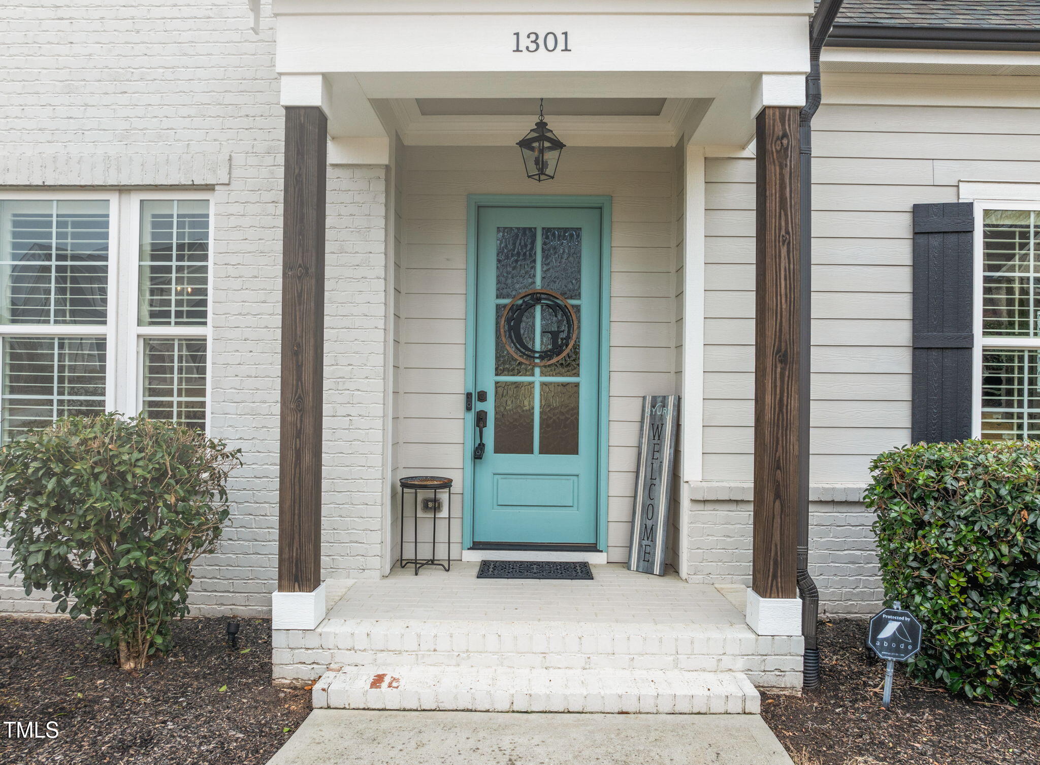 1301 Mackinaw Drive Wake Forest, NC 27587 - Photo 9 of 55 a front view of a house with a garden