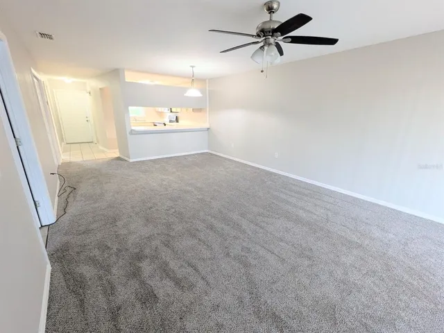 a view of a kitchen with a dishwasher and a refrigerator