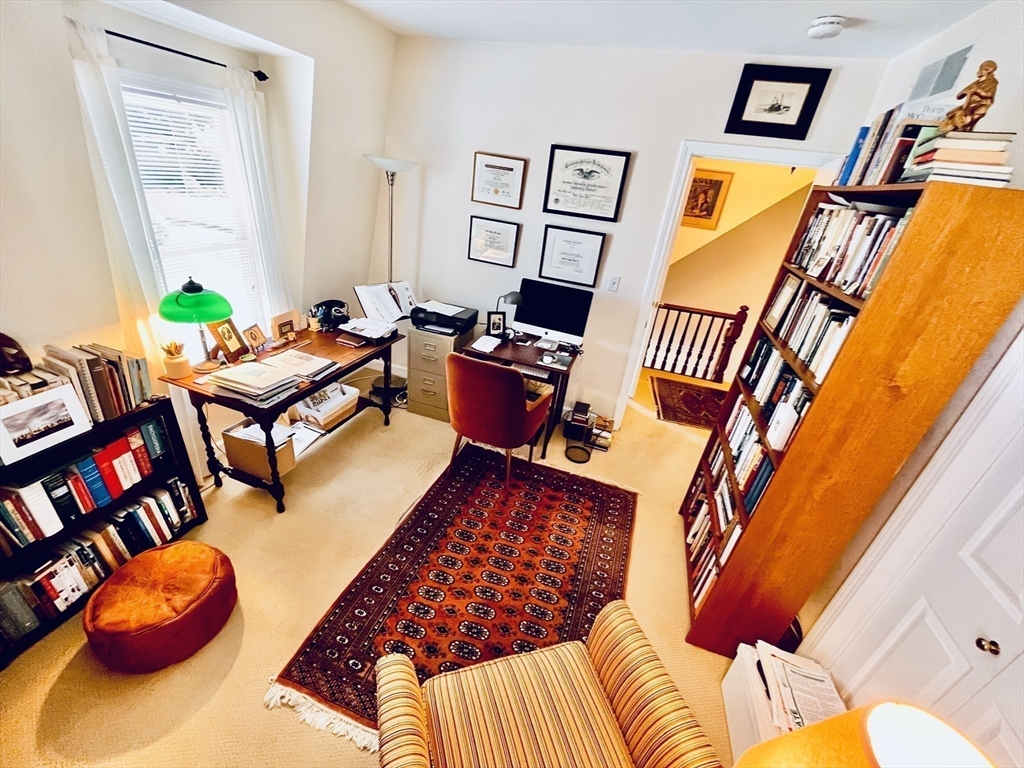 16 Pleasant Street Hamilton, MA 01982 - Photo 12 of 16 a living room with furniture and wooden floor