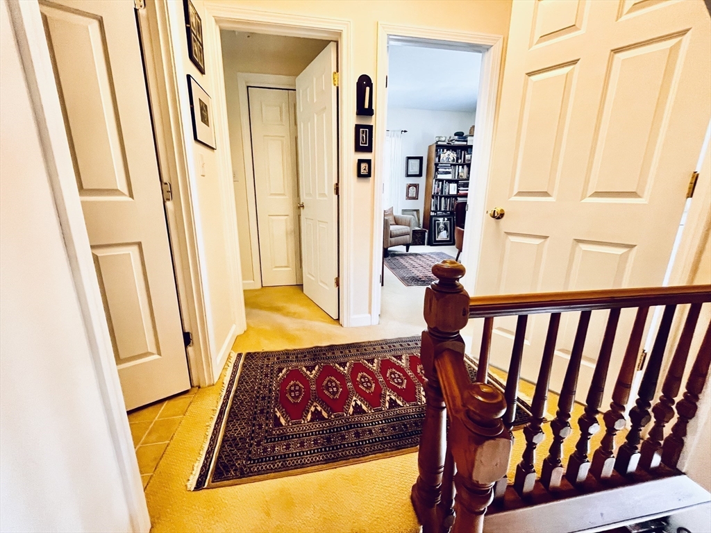 16 Pleasant Street Hamilton, MA 01982 - Photo 9 of 16 kids bedroom with wooden floor and window