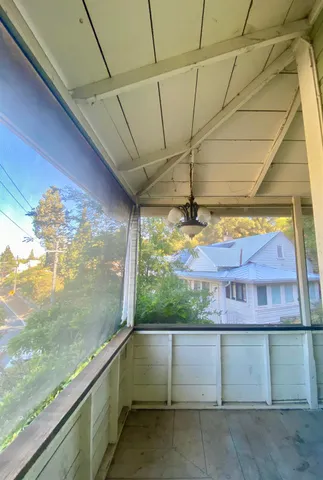 a kitchen with a sink and a stove top oven
