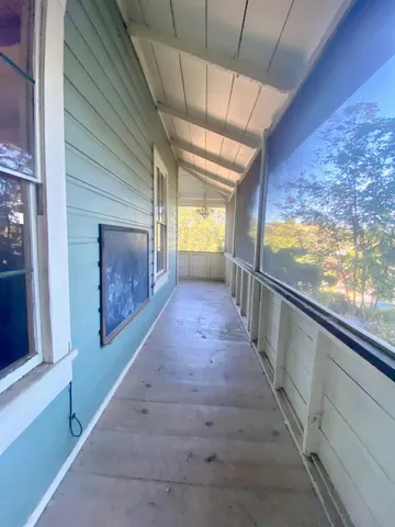a kitchen with a sink cabinets and window