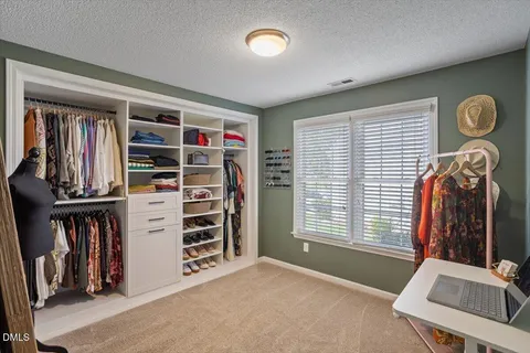 a bathroom with a sink double vanity and a mirror