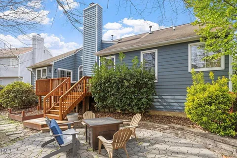 a view of a park with iron fence