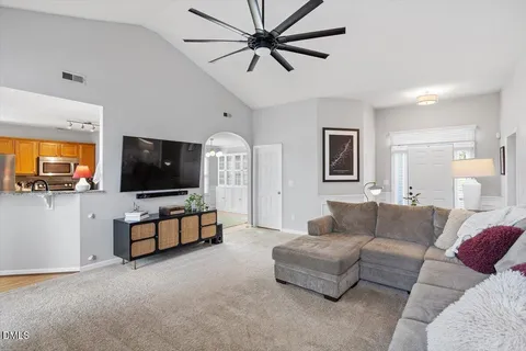 a dining room with furniture and window