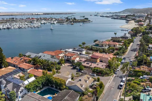 an aerial view of a city with lake view