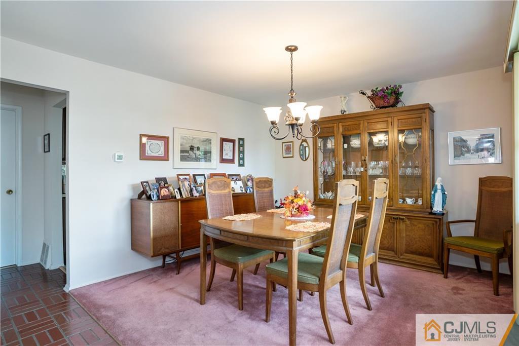 55 Gramercy Road Old Bridge, NJ 08857 - Photo 6 of 22 a view of a dining room with furniture