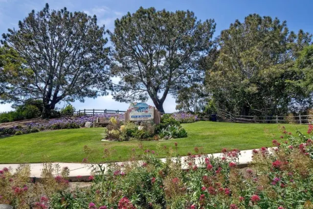 a view of a golf course with a lake