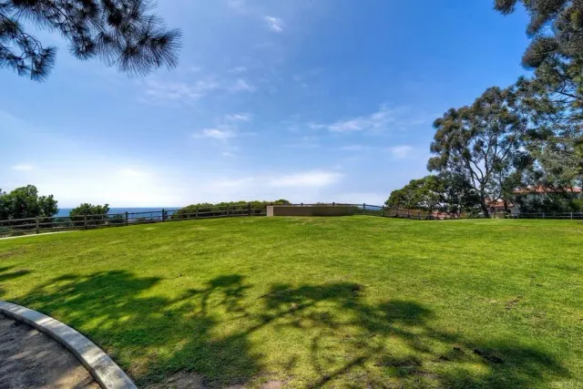 a view of a street with cars