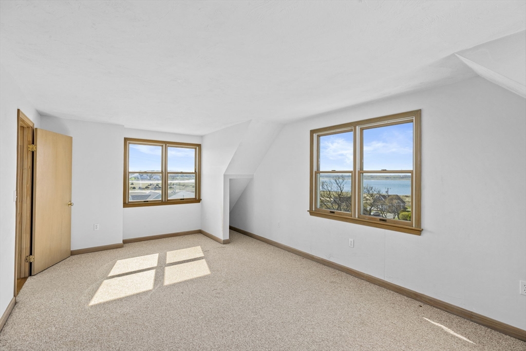 5 Silver Road Scituate, MA 02050 - Photo 16 of 30 a view of an empty room with a window