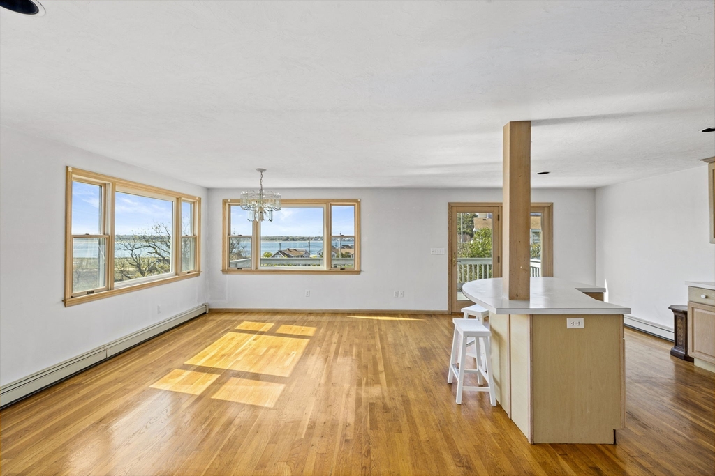 5 Silver Road Scituate, MA 02050 - Photo 3 of 30 a view of kitchen with furniture and wooden floor