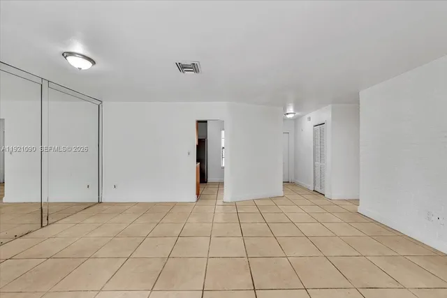 a backyard of a house with yard and outdoor seating