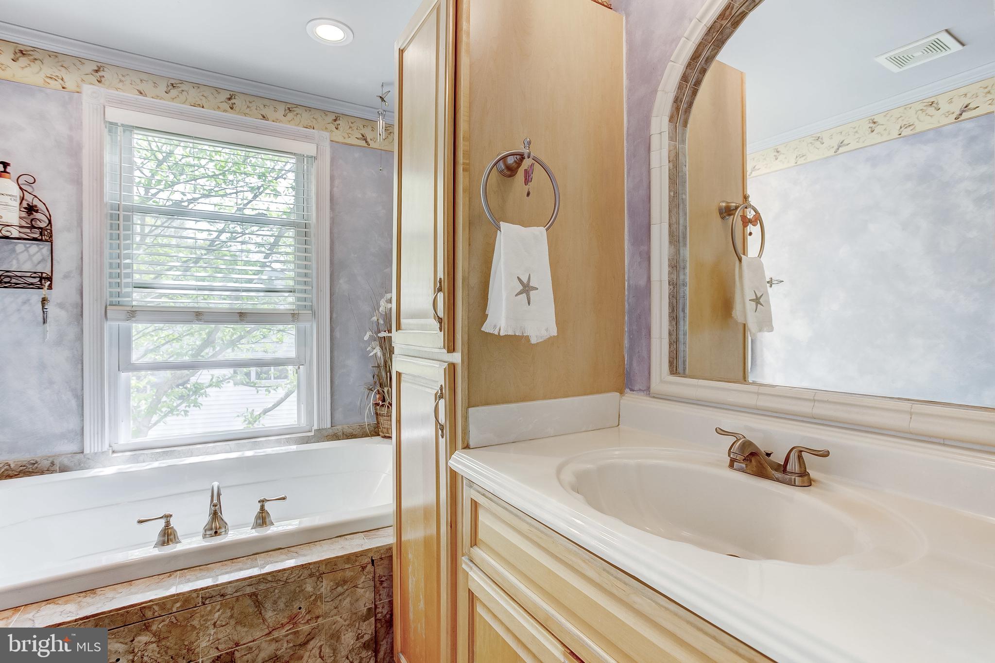 4223 Haycoke Road Baltimore, MD 21236 - Photo 21 of 43 Updated bathroom with large tub.