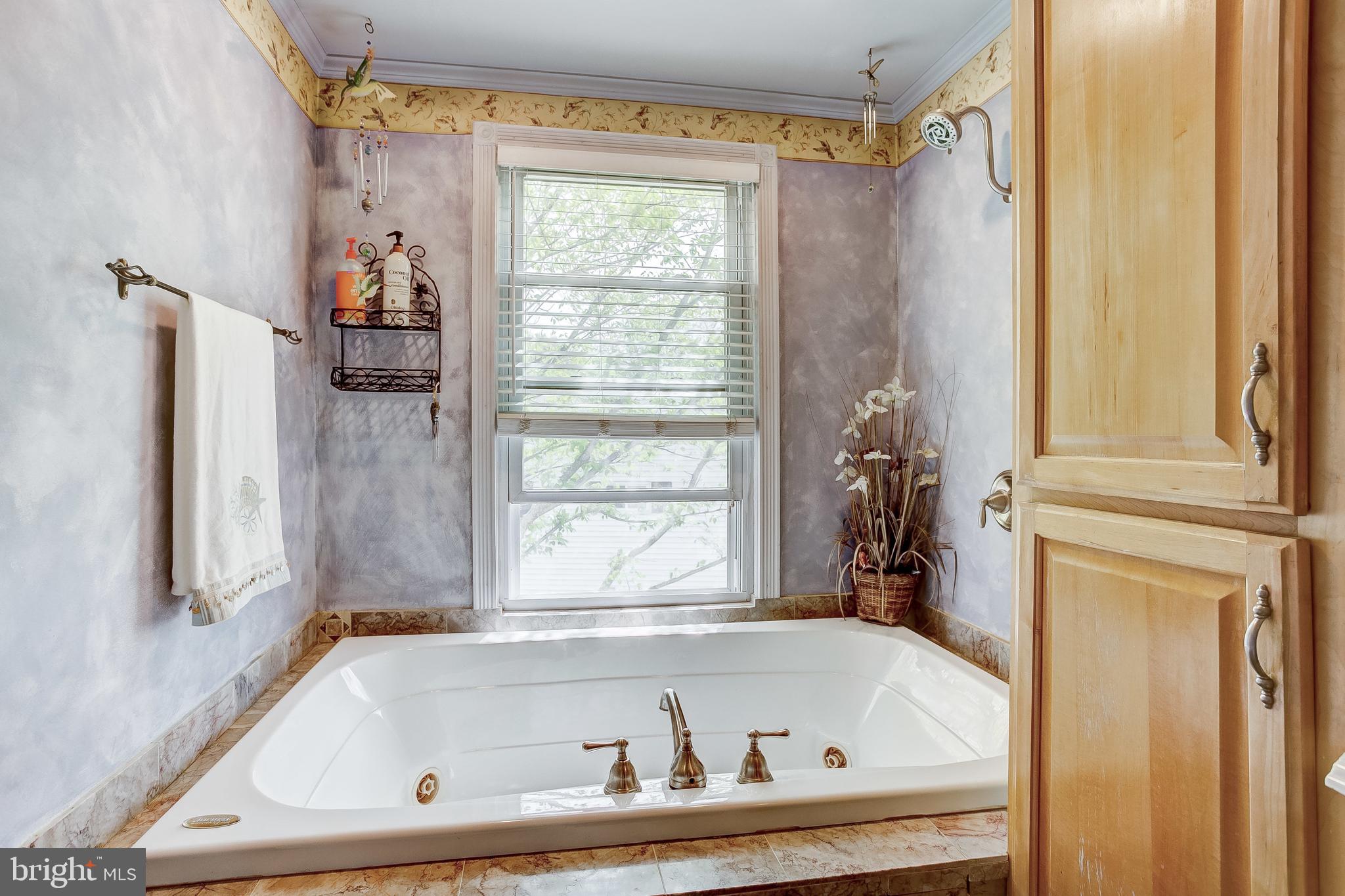 4223 Haycoke Road Baltimore, MD 21236 - Photo 22 of 43 Updated bathroom with large tub.