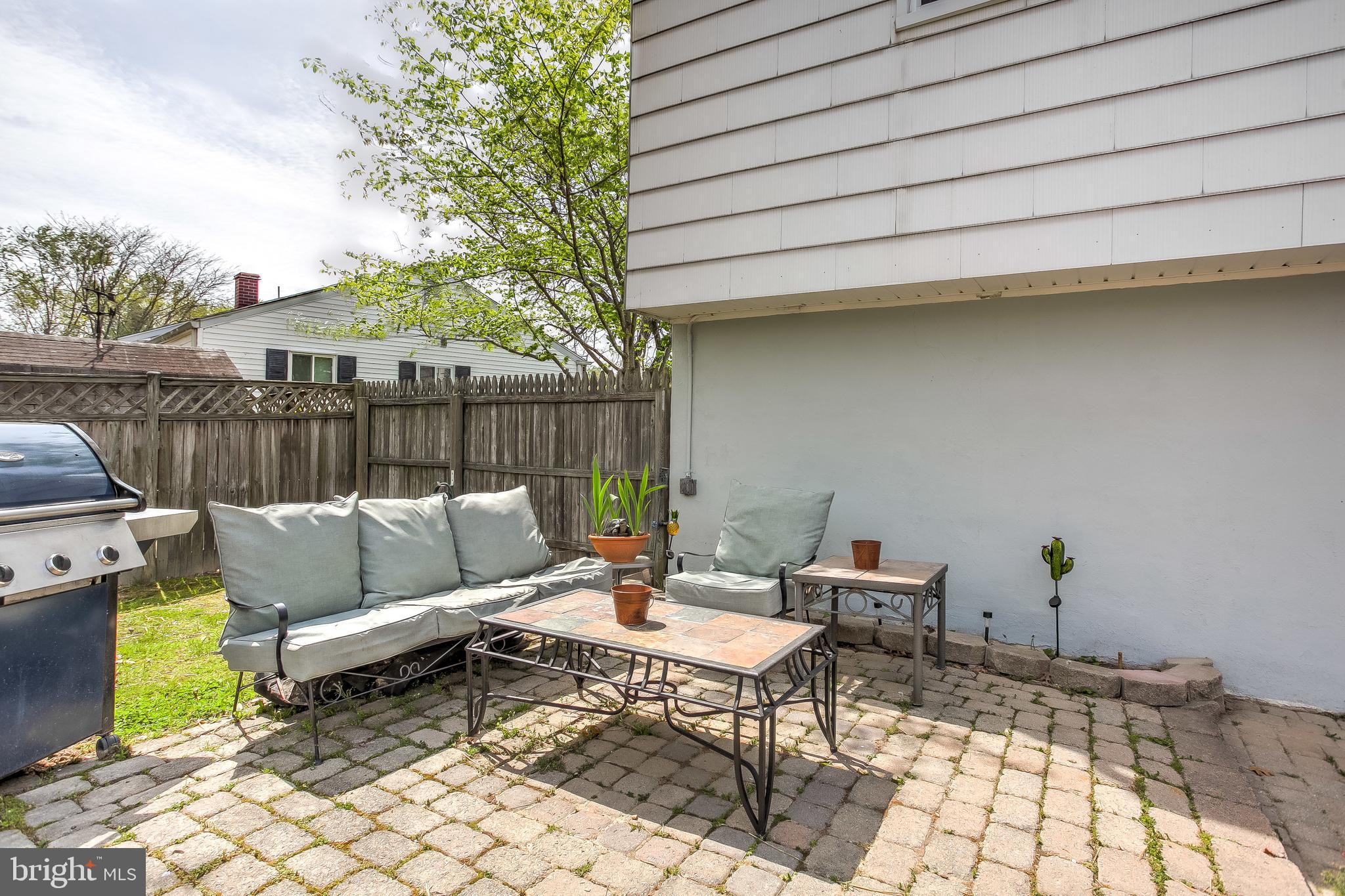 4223 Haycoke Road Baltimore, MD 21236 - Photo 33 of 43 Pond and patio, entertainment area.