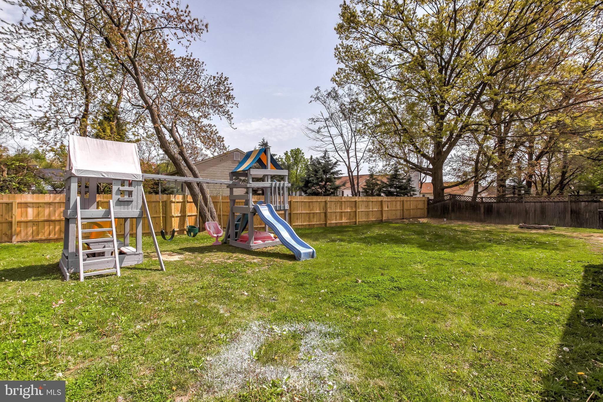 4223 Haycoke Road Baltimore, MD 21236 - Photo 35 of 43 Large fenced in backyard with play equipment.