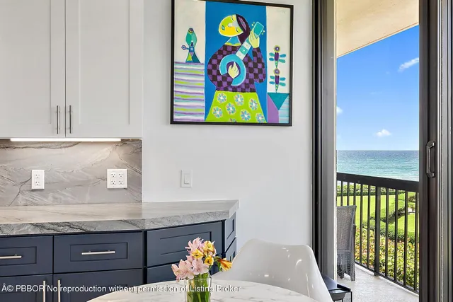 a large kitchen with stainless steel appliances granite countertop a sink stove and cabinets