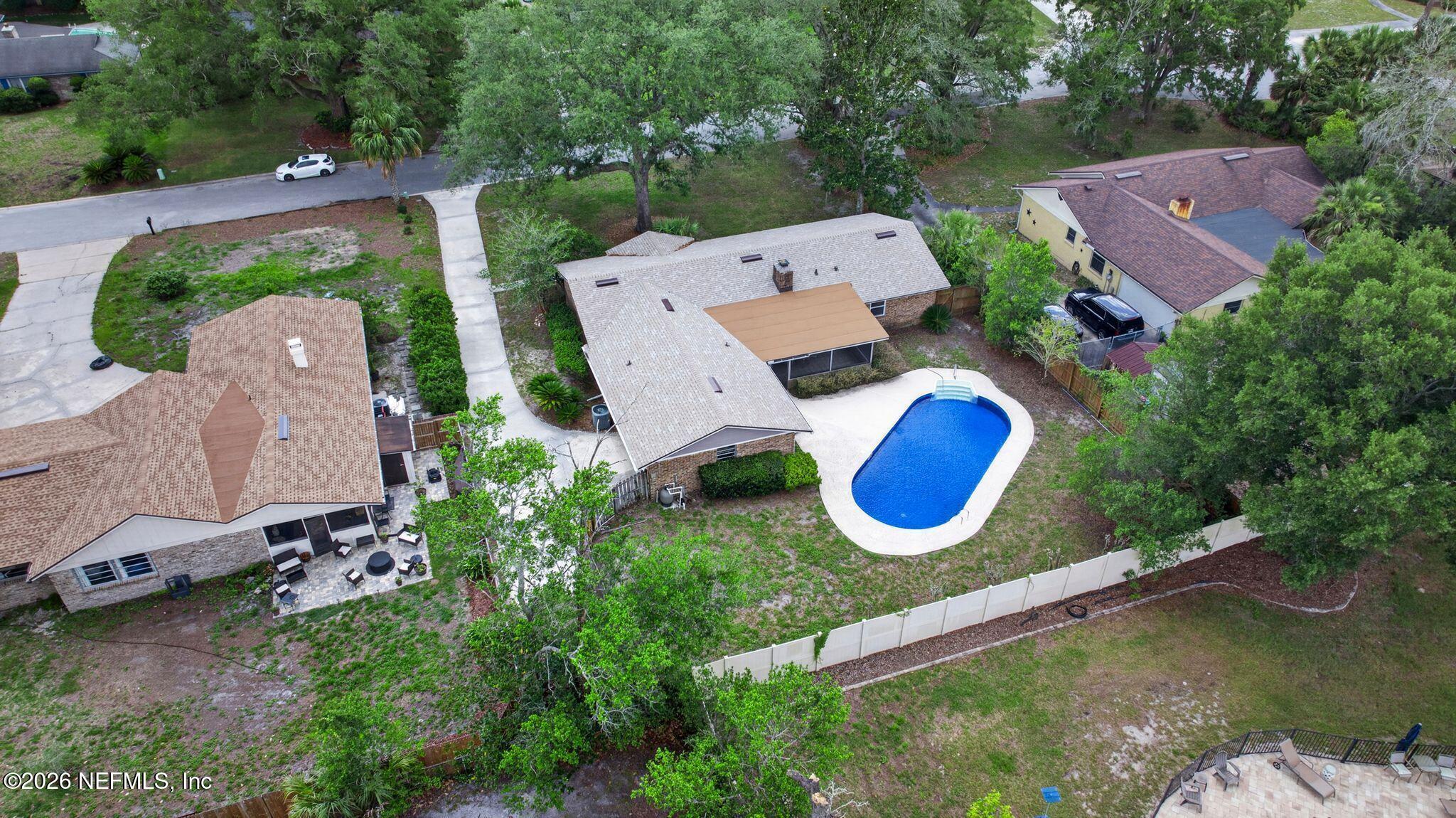 138 Ridgefield Court Orange Park, FL 32065 - Photo 61 of 64 an aerial view of a house with garden space swimming pool and outdoor seating
