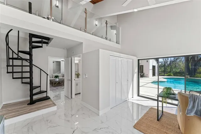 a workspace with furniture and window