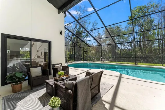 a view of living room with granite countertop furniture and fireplace