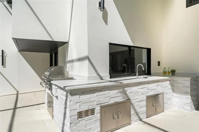 a view of swimming pool with seating space