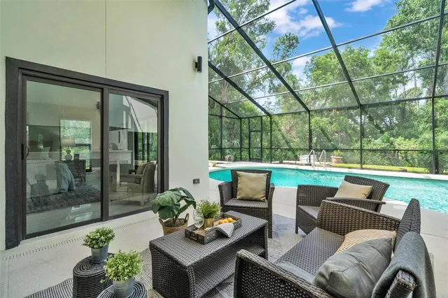 a view of a house with backyard and garden