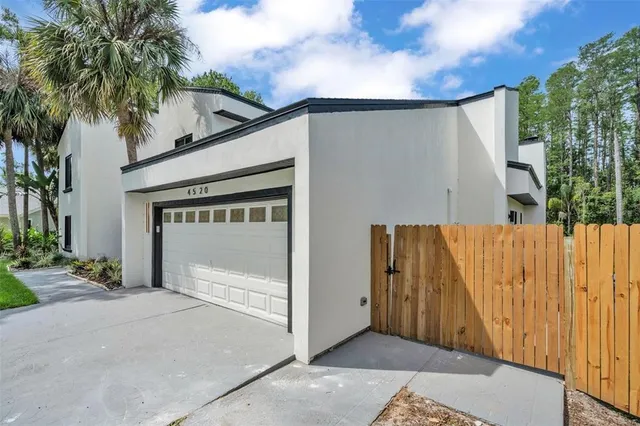 a view of field with trees in the background