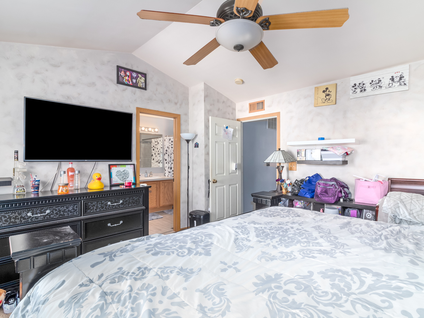 2262 Georgetown Circle Aurora, IL 60503 - Photo 14 of 25 a bedroom with a bed and a flat screen tv
