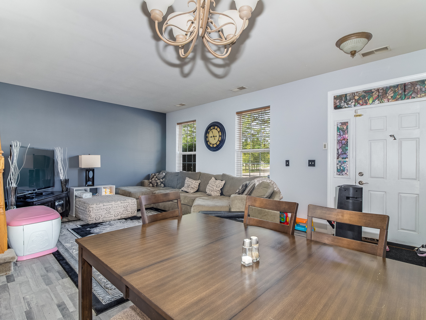 2262 Georgetown Circle Aurora, IL 60503 - Photo 7 of 25 a living room with furniture and wooden floor