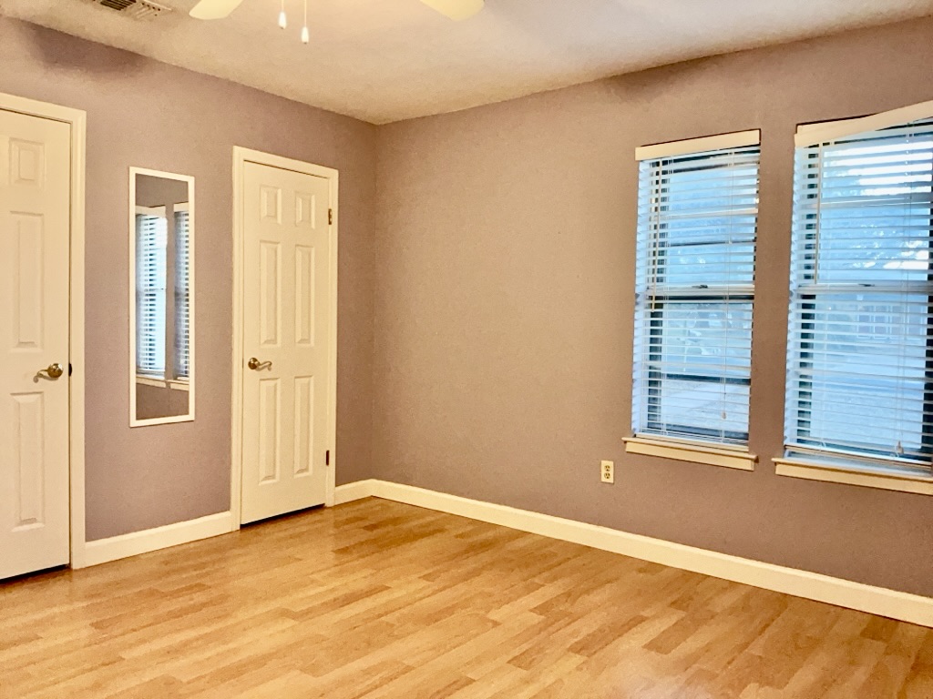 418 Sunset Drive Georgetown, TX 78628 - Photo 22 of 26 Bedroom with light wood-style floors and a ceiling fan