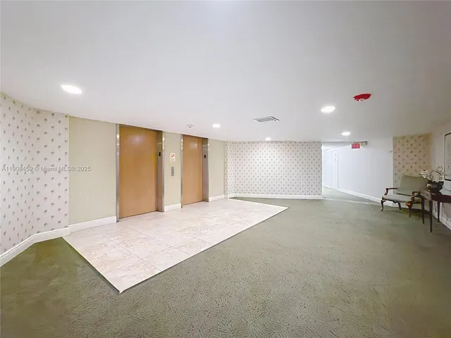 front view of a house with a yard and plants