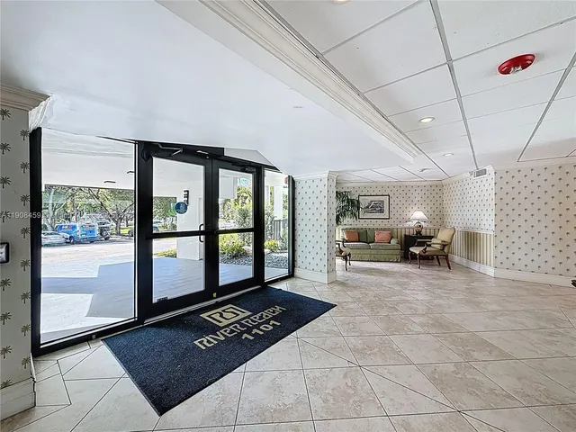 a view of a livingroom with furniture and a rug