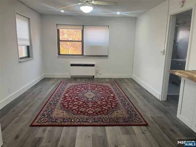 an entryway door with a rug