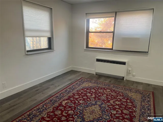 a kitchen with a stove and a microwave