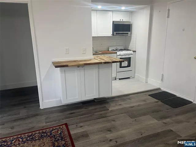 a utility room with washer and dryer