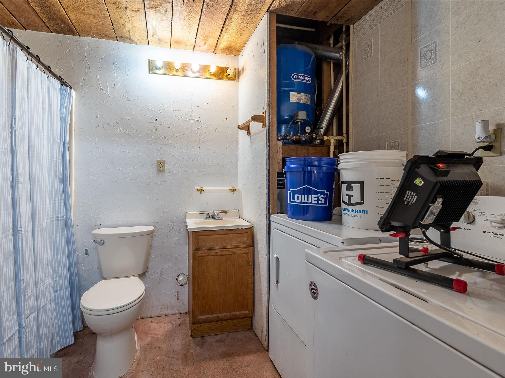 2822 Mauzy Road Berkeley Springs, WV 25411 - Photo 33 of 63 Lower level bath & laundry