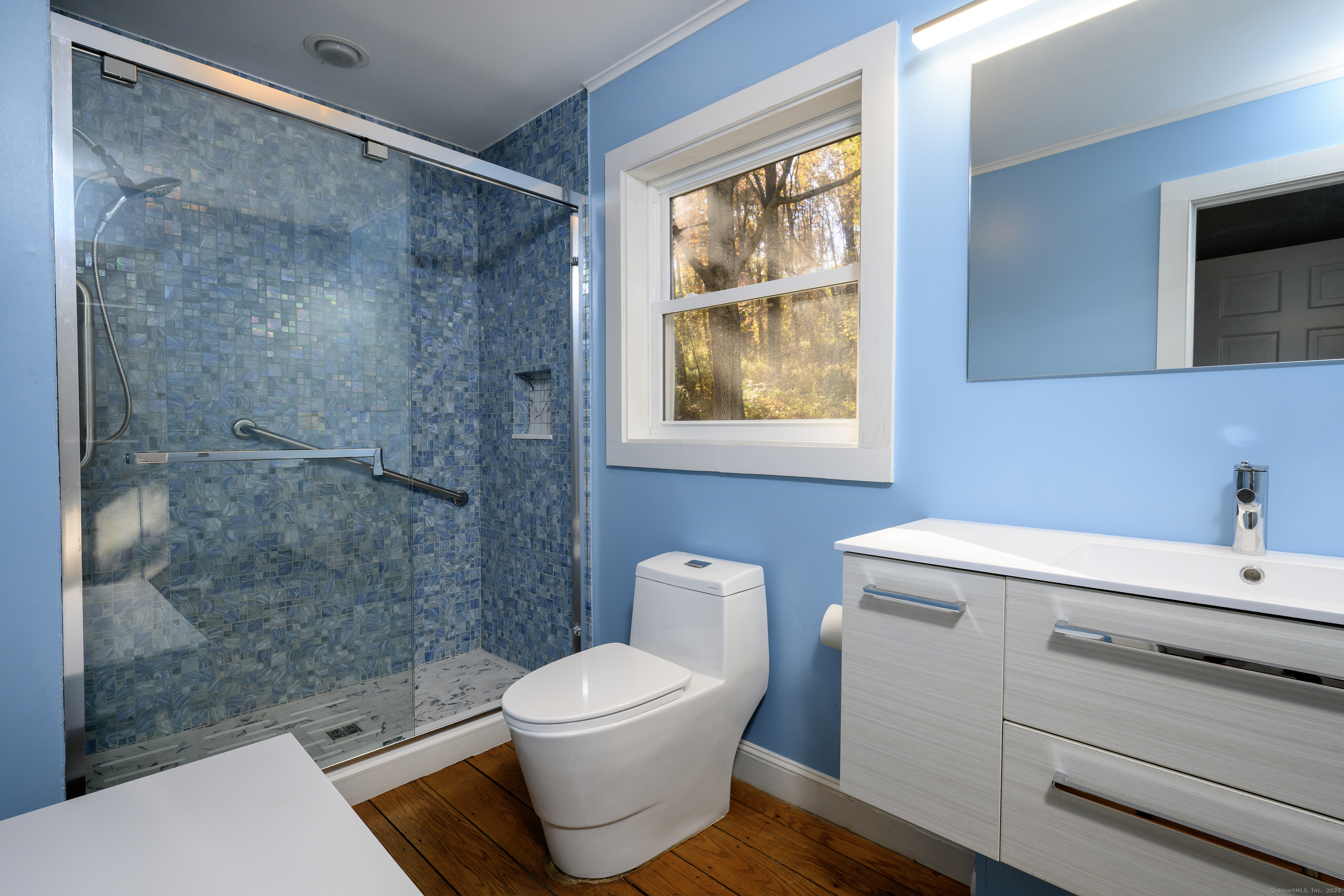 103 Geer Mountain Road South Kent, CT 06785 - Photo 20 of 36 a bathroom with a toilet a sink and a shower