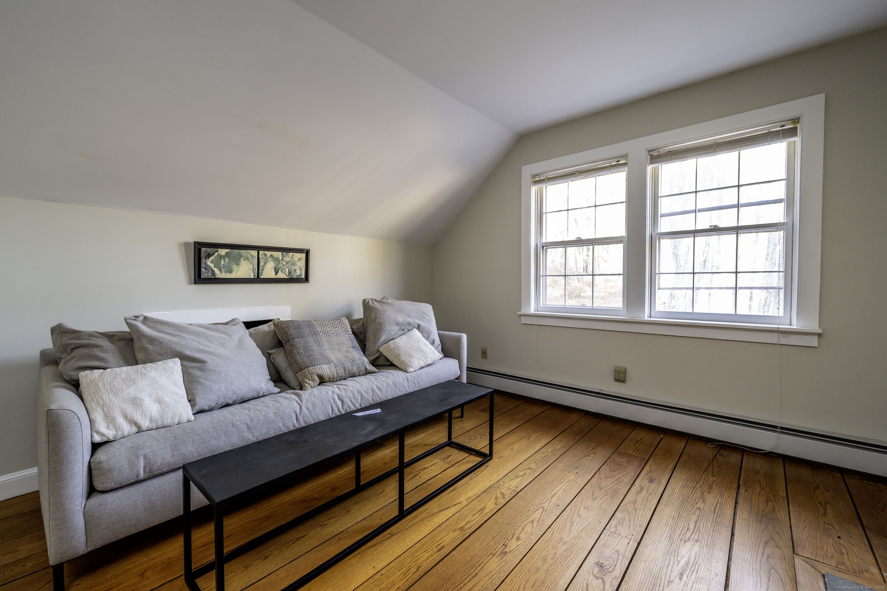 103 Geer Mountain Road South Kent, CT 06785 - Photo 24 of 36 a living room with furniture and a window