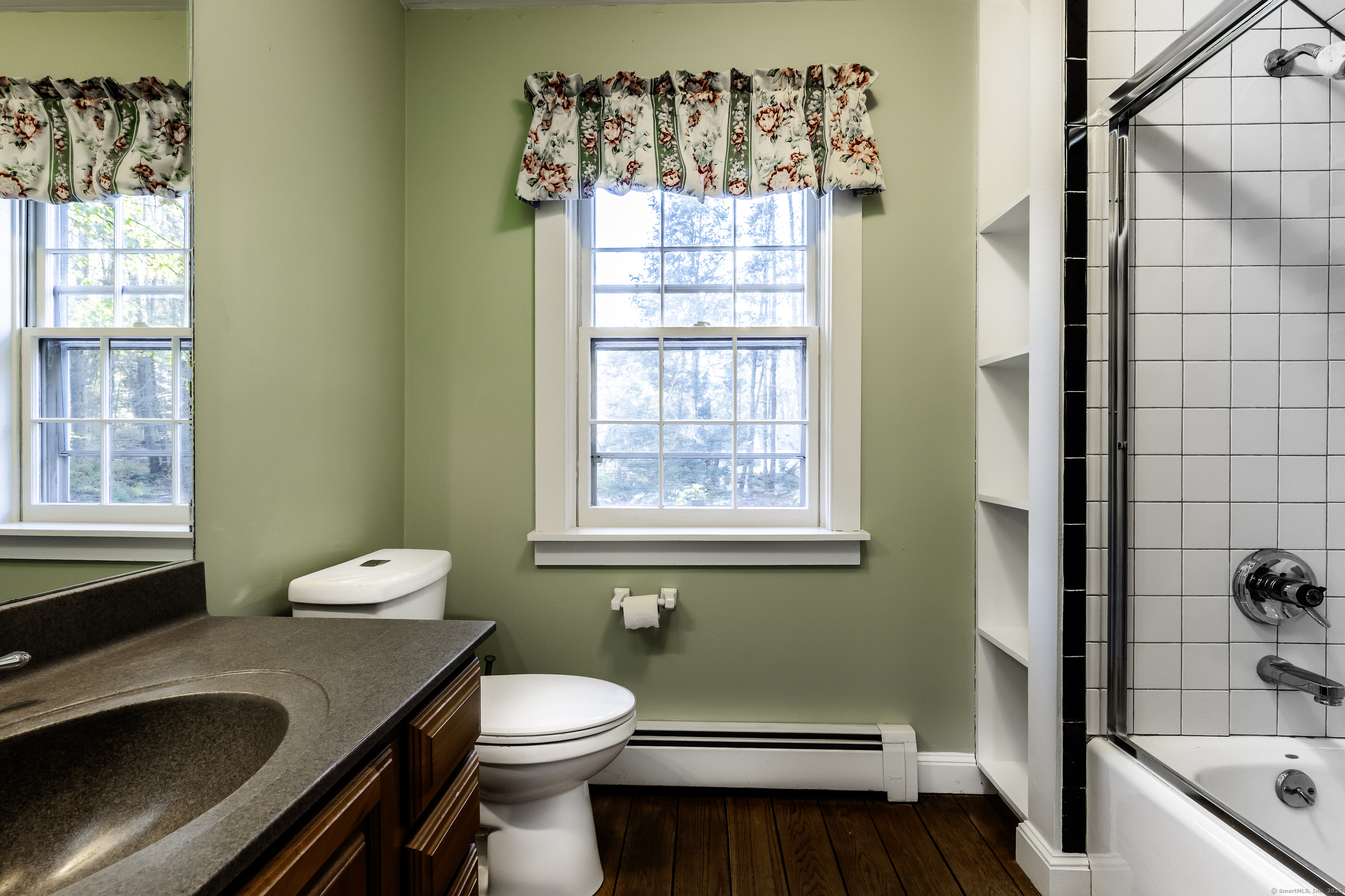 103 Geer Mountain Road South Kent, CT 06785 - Photo 26 of 36 a bathroom with a sink a toilet and tub