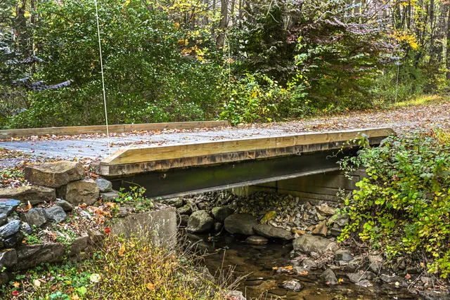 a view of house with a lake view